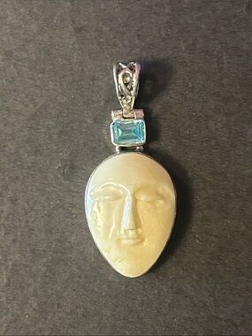 .925 Sterling Blue Topaz Hinged Moon Carved Goddess Pendant